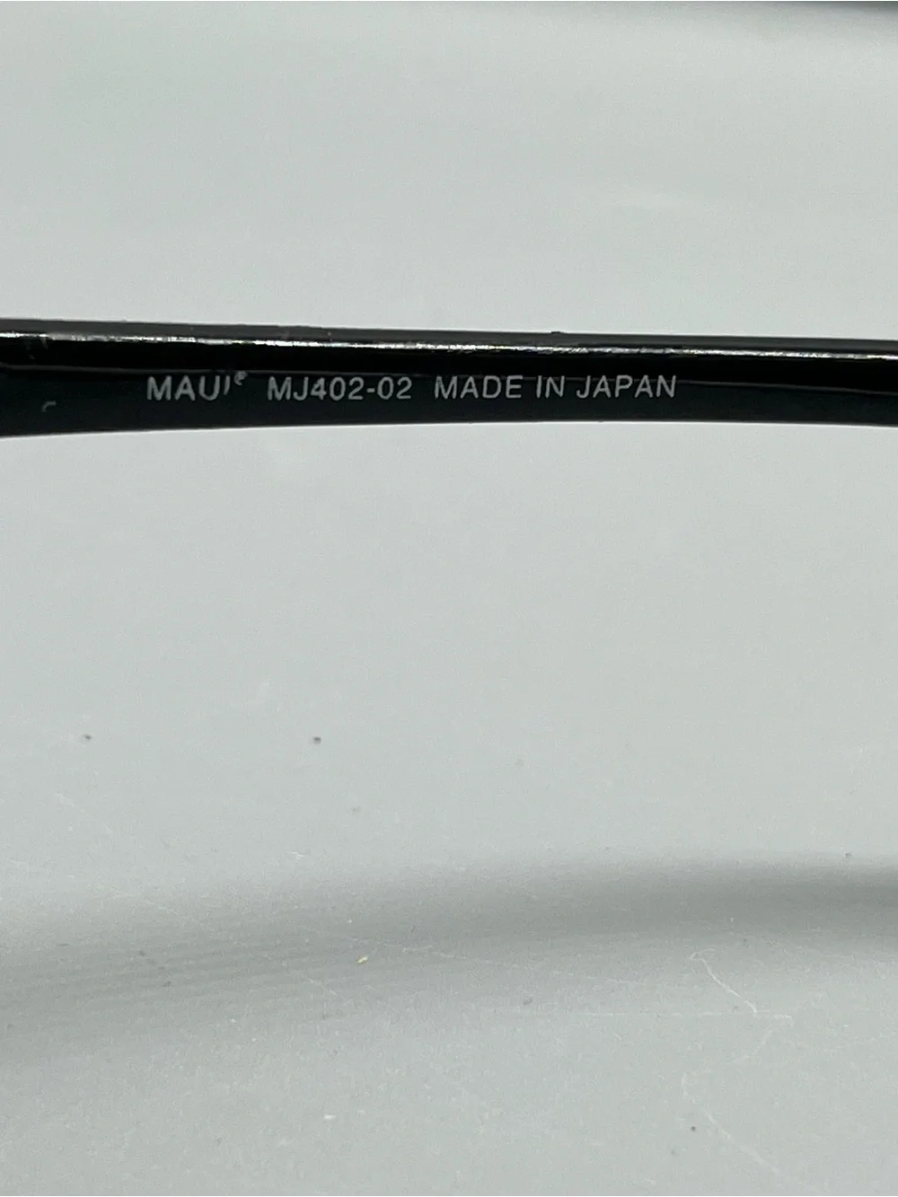 Maui Jim Black Frame Grey Lens Shield Sunglasses with Brown Case